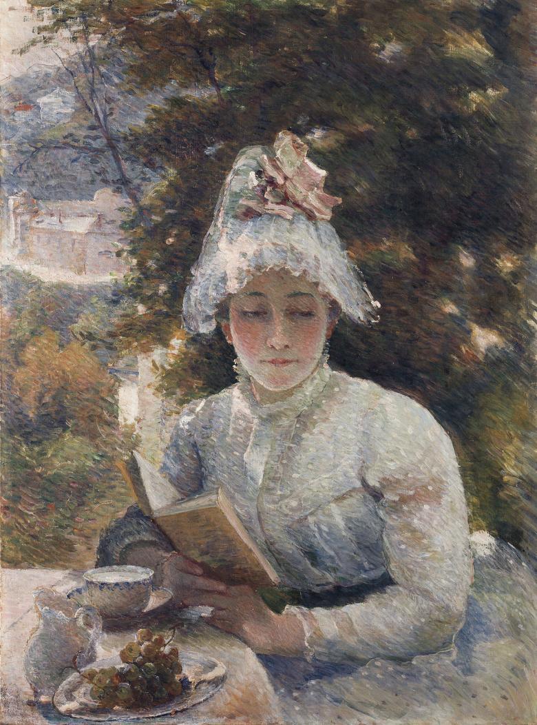 A painting of a woman dressed in white, including a white bonnet, sitting at a table reading a book. Behind her, we see a tree, greenery and a building in the distance; in front of her on the table, a teacup and plate.