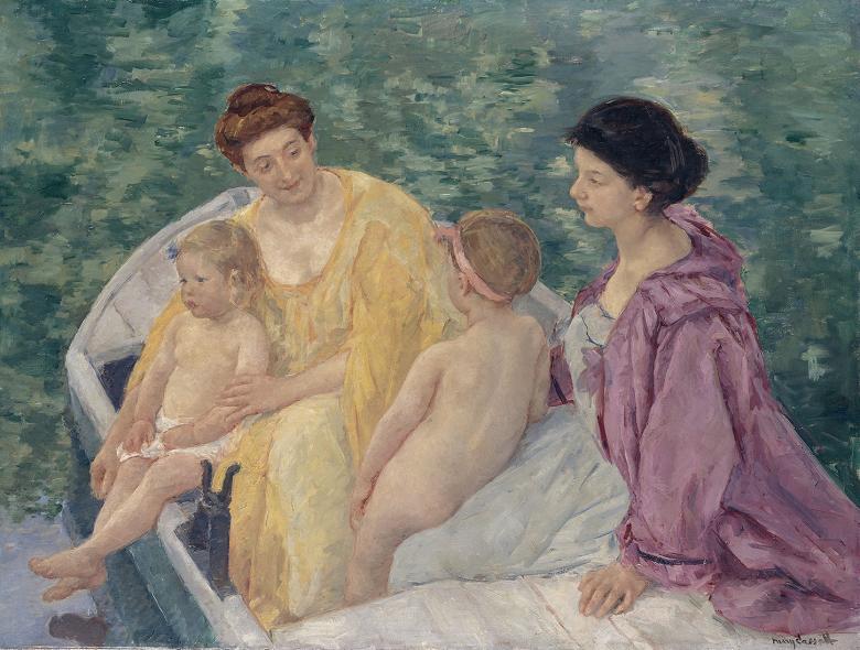 Two women sit in a row boat with two children. The children are naked, and one is trailing her feet in the water. The women are dressed in yellow, pink and white.