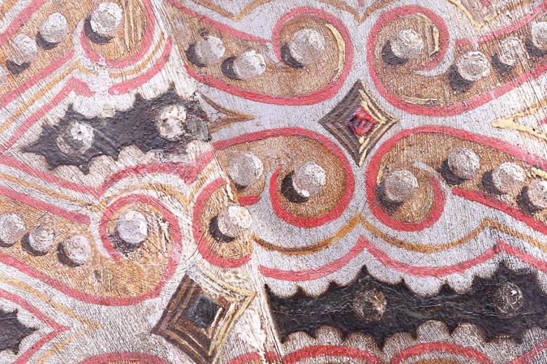 Detail of the intricate pattern of the Queens’ gown