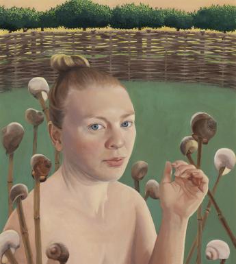 A woman crouches among snail shells, displayed on sticks. In the background, trees and a woven fence.