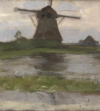 A view of a windmill in the countryside