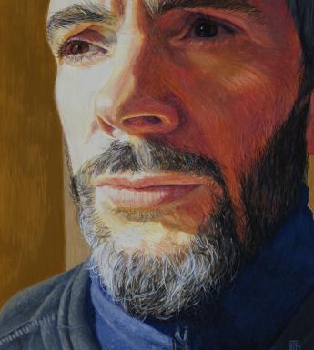 Close-up view of a bearded man's face