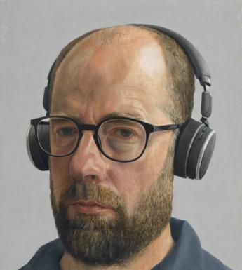 An oil portrait of a bearded man's head. He wears glasses and a large pair of headphones. His expression is sombre