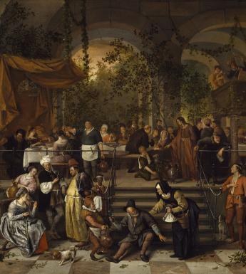 A banquet scene filled with figures. The table is set up beside large arches through which we can see trees and greenery.