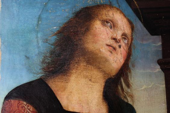 Detail from Perugino's 'The lamentation over the dead Christ' showing the figure of Nicodemus after cleaning, but before restoration.