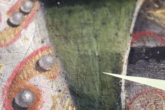 Detail of an oil painting showing green malachite pigment
