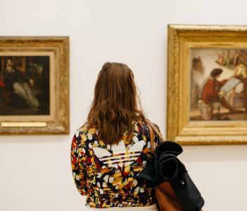 A visitor inside the exhibition rooms of the Millennium Wing. © National Gallery of Ireland.